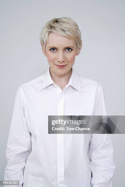 portrait of a blonde woman - white blouse stock pictures, royalty-free photos & images