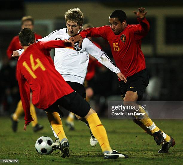 Markus Marin of Germany in action with Wouter Corstjens and Vadis Odjidja Ofoe of Belgium during the friendly match between U21 of Germany and U23 of...
