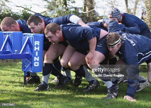 Tim Payne, who will replace the injured Andrew Sheridan packs down with fellow front row Mark Regan and Phil Vickery during England rugby training at...