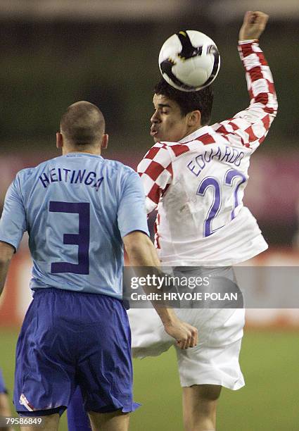 Eduardo Da Silva of Croatia vies with Netherland's John Heitinga during their friendly football match on February 6, 2008 in Split. AFP PHOTO/ HRVOJE...