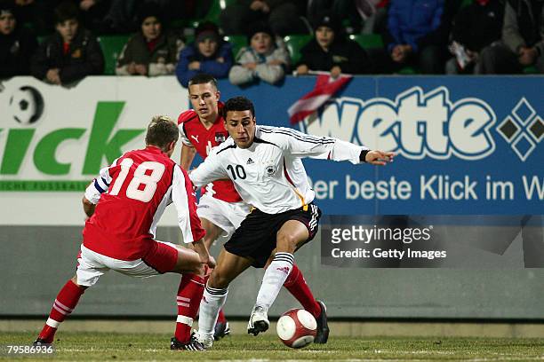 Thomas Hinum of Germany and Aenis Ben-Hatira of Austria during the U20 international friendly match between Germany and Austria at the Waldstadion on...