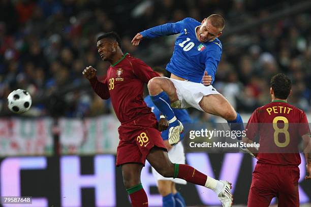 Daniele De Rossi of Italy challenges Makukula of Portugal during the International Friendly match between Italy and Portugal at the Letzigrund...