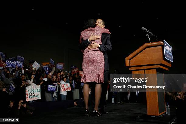 Presidential candidate Sen. Barack Obama and his wife Michelle Obama take the stage for his victory rally at the Columbia Metropolitan Convention...