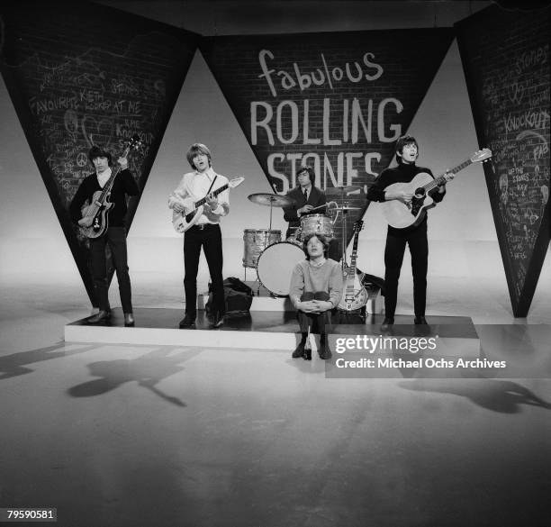 The Rolling Stones Bill Wyman, Brian Jones, Charlie Watts, Mick Jagger and Keith Richards rehearse for an appearance on a British TV show in 1965 in...