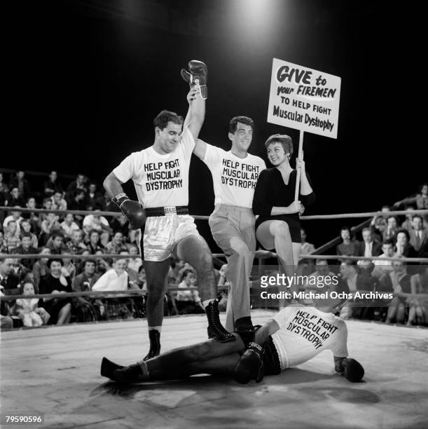 Heavyweight champion of the world Rocky Marciano defeats Jerry Lewis in a mock boxing match to aid Muscular Dystrophy on November 18, 1954 in Los...
