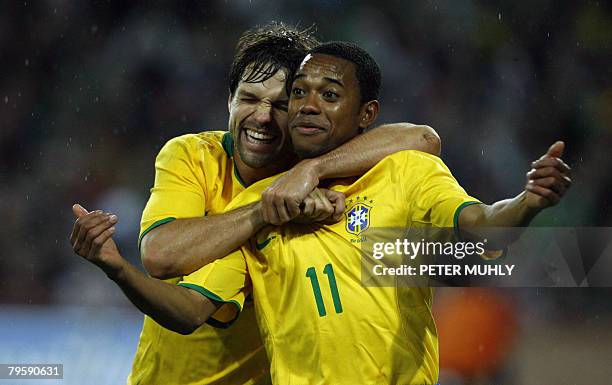 Brazil's Robson Souza celebrates with team mate Diego Ribas after scoreing against Ireland on February 6, 2008 during an International match in...