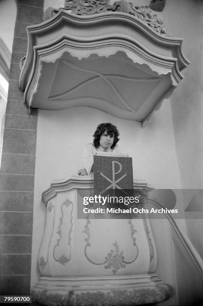 Jim Morrison of the Doors visits a church while on tour on September 14 1968 in Frankfurt, West Germany.
