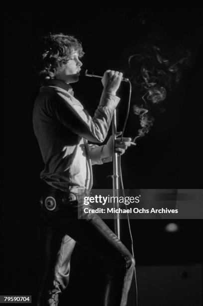Jim Morrison of the Doors performs live on stage at the Kongresshalle on September 14 1968 in Frankfurt, West Germany.