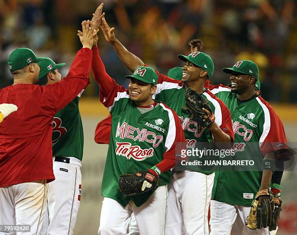 Mexican Yaquis baseball team celebrate their victory over the Tigres del Licey of the Dominican Republic during a Caribbean Series game at the Cibao...