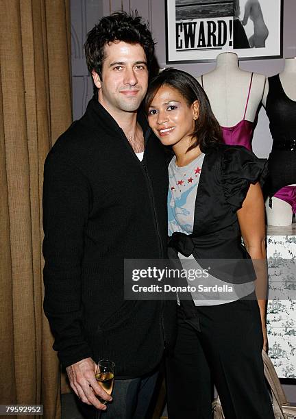 Actor Troy Garrity and Simone Bent during the Kiki De Montparnasse store opening at Kiki De Montparnasse on December 3, 2007 in Los Angeles,...