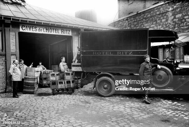 Wine delivery at the cellars of the Ritz hotel in the 1st arrondissement, Paris, circa 1905.