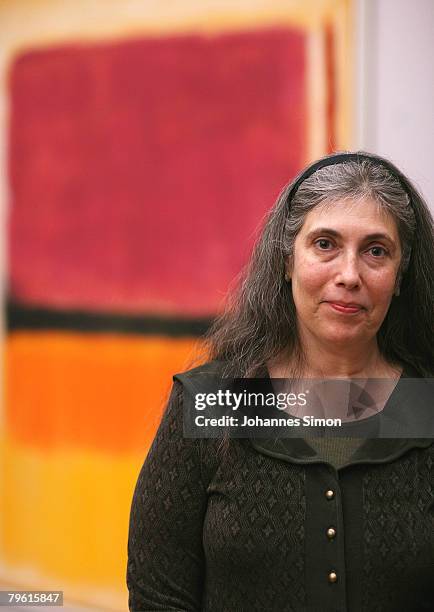 Kate Rothko Prizel, daughter of US painter Mark Rothko, poses beside of one of his father's paintings during a press conference at the Munich...