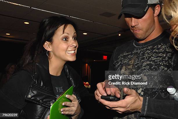Singer Sara Evans and Jay Barker attend the Official Super Bowl XLII Talent and Player Gift Lounge produced by the NFL and ON 3 Productions held at...