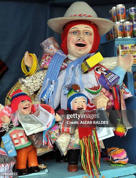 'Ekekos' -the Andean deity of plenty and good fortune- are for sell during the traditional Alasitas fair in La Paz on February 1, 2008. According to...