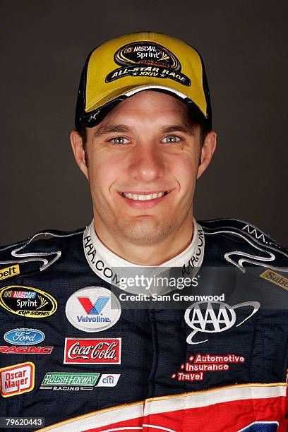 David Ragan, driver of the AAA Ford, poses for a photo during the NASCAR Sprint Cup Series media day at Daytona International Speedway on February 7,...