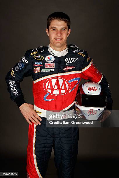 David Ragan, driver of the AAA Ford, poses for a photo during the NASCAR Sprint Cup Series media day at Daytona International Speedway on February 7,...