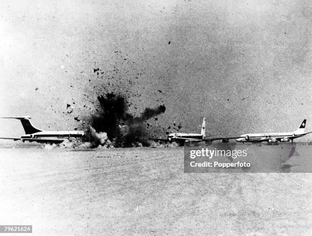 Terrorism Amman, Jordan, Hi-jackers blew up three planes at Dawson's Field, The first was a Boeing 707 which can be seen exploding in the picture