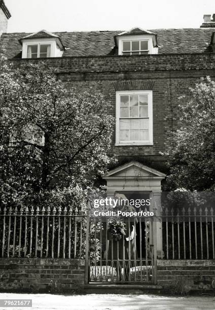 English writer and novelist Agatha Christie stands at the front gate of her home, Winterbrook House near Wallingford, Oxfordshire in 1950. Agatha...