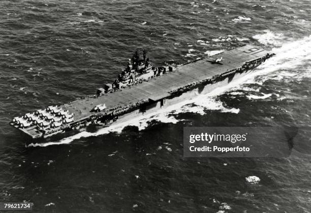 War and Conflict, World War Two, pic: 9th January 1945, The USS, "Lexington" pictured at sea with the flight deck and aircraft shown