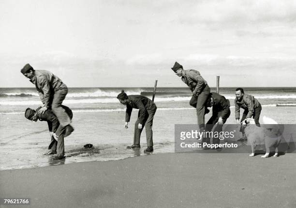 War and Conflict, World War Two, pic: April 1942, American soldiers on the sands of Northern Ireland, enjoying a game of leapfrog