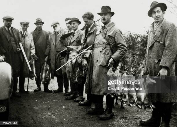 War and Conflict, World War Two, pic: October 1940, Food / Britain, Farmers with rabbits they have shot to help the wartime meat rations.