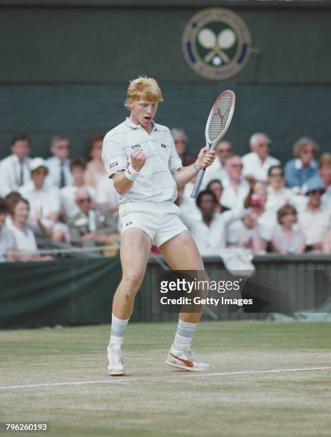 Boris Becker of Germany pumps his fist in celebration during his Men's Singles final match against Kevin Curren during the Wimbledon Lawn Tennis...