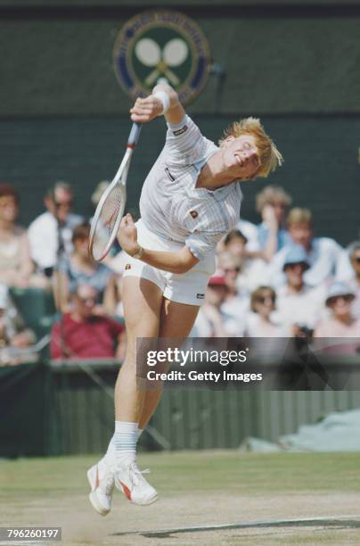 Boris Becker of Germany serves to Kevin Curren during the Men's Singles final of the Wimbledon Lawn Tennis Championship on 7 July 1985 at the All...