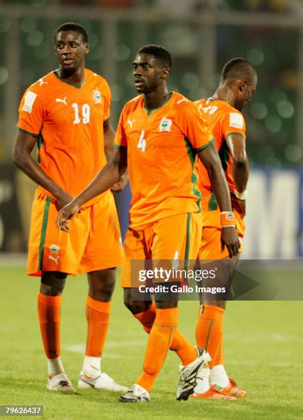 Yaya Toure and brother Kolo Toure of the Ivory Coast look dejected during the AFCON semi-final match between Ivory Coast and Egypt held at the Baba...