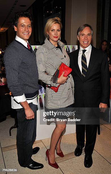 Ioan Gruffudd, Alice Evans and Tommy Hilfiger pose backstage at the Tommy Hilfiger Fall 2008 fashion show during Mercedes-Benz Fashion Week Fall 2008...