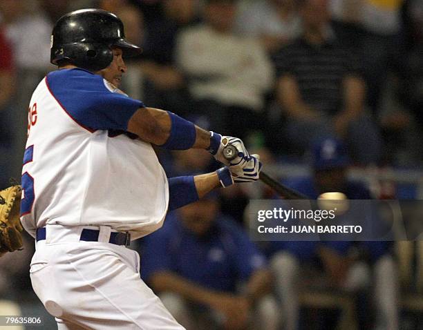 Rafael Furcal of Dominican Aguilas del Cibao bats against Dominican Tigres de Licey during a Caribbean Series game at the Cibao stadium in Santiago...