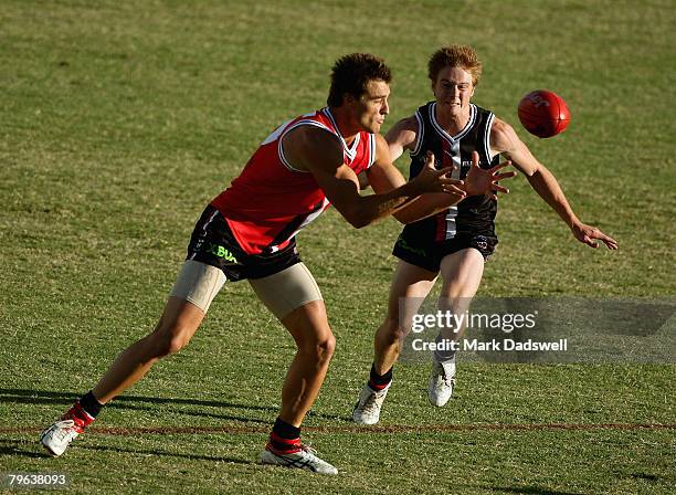 Sam Fisher of the red team marks ahead of his opponent during a St Kilda Saints intra-club practice match held at Moorabbin Oval February 8, 2008 in...