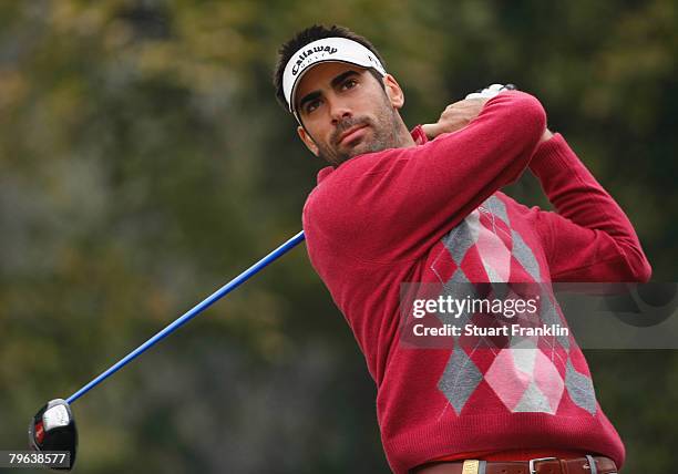 Alvaro Quiros Garcia of Spain plays his tee shot on the third hole during the second round of the Emaar-MGF Indian Masters at the Delhi Golf Club on...