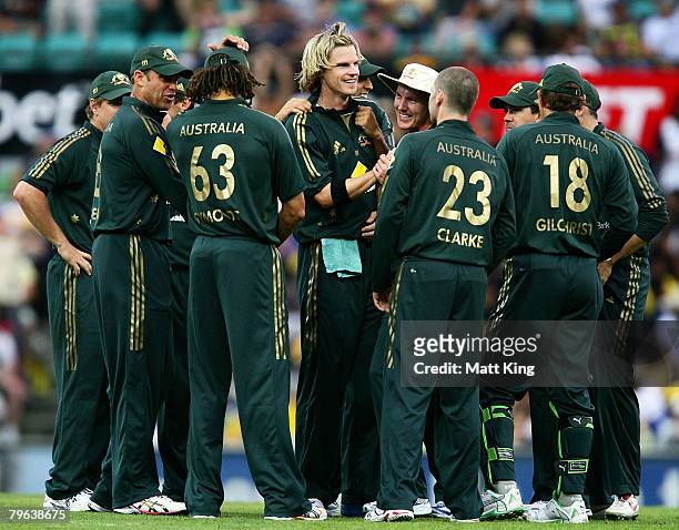 Nathan Bracken of Australia is congratulated by his team mates after taking the wicket of Upul Tharanga of Sri Lanka during the Commonwealth Bank...