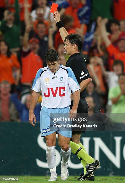 Robbie Middleby is shown the red card during the A-League minor semi final second leg match between the Queensland Roar and Sydney FC at Suncop...