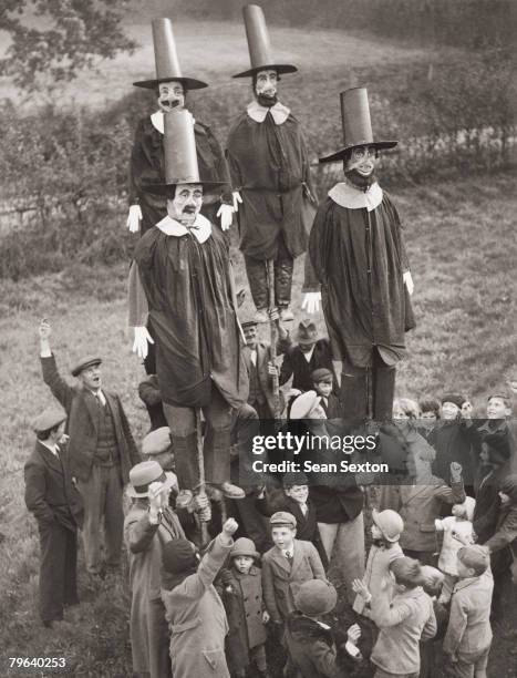 English schoolchildren celebrate Guy Fawkes Night by erecting effigies of the would-be terrorist, circa 1935. These effigies will be carried through...