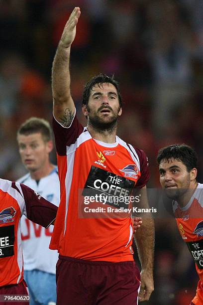 Sasa Ognenovski of the Roar celebrates scoring the Roars second goal during the A-League minor semi final second leg match between the Queensland...