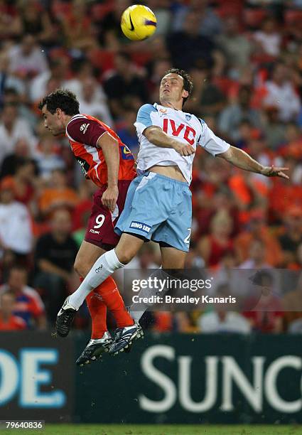 Iain Fyfe of Sydney and Simon Lynch of the Roar compete for the ball during the A-League minor semi final second leg match between the Queensland...