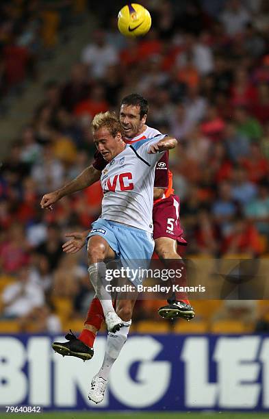 Ruben Zadkovich of Sydney Josh McCloughan of the Roar compete for the ball during the A-League minor semi final second leg match between the...