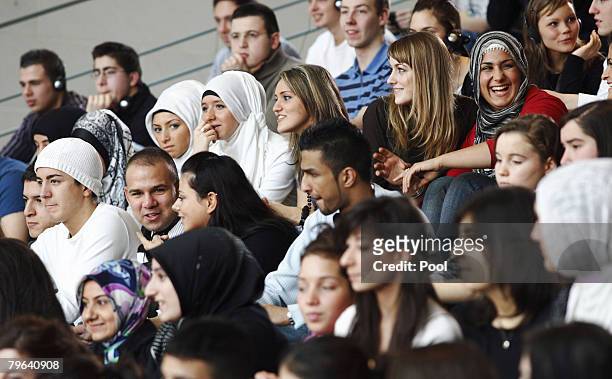 Turkish and German pupils and students listen to German Chancellor Angela Merkel and Turkish Prime minister Recep Tayyip Erdogan at the Chancellery...