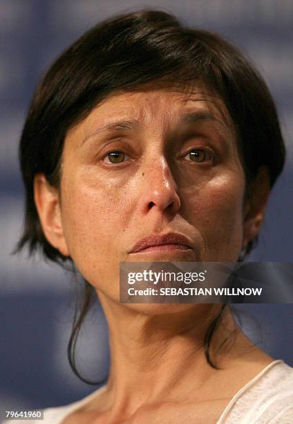 Actress Rona Lipaz-Michael listens in during a press conference for the film "Lemon Tree" at the 58th International Film Festival in Berlin on...