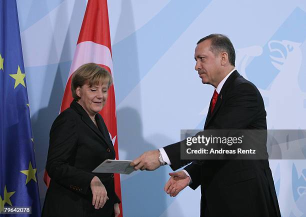 German Chancellor Angela Merkel and Turkish Prime Minister Tayyip Erdogan attend a news conference at the Chancellery on February 8, 2008 in Berlin,...