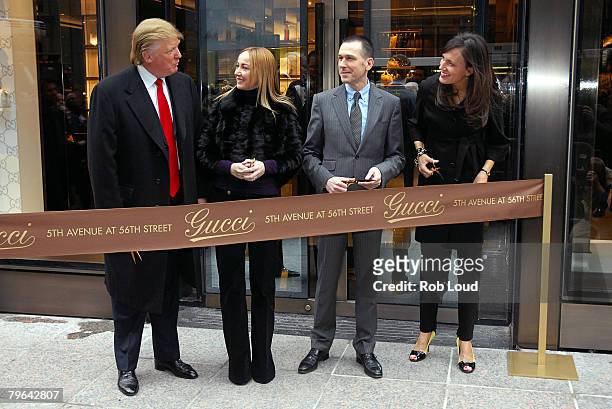 Donald Trump joins Gucci Creative Director Frida Giannini, Gucci CEO Mark Lee and Gucci President Daniella Vitale for the new flagship store ribbon...