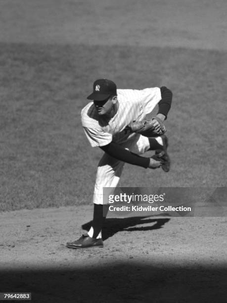 Pitcher Don Larsen of the New York Yankees follows through on a pitch during game 5 of the World Series on October 8, 1956 against the Brooklyn...