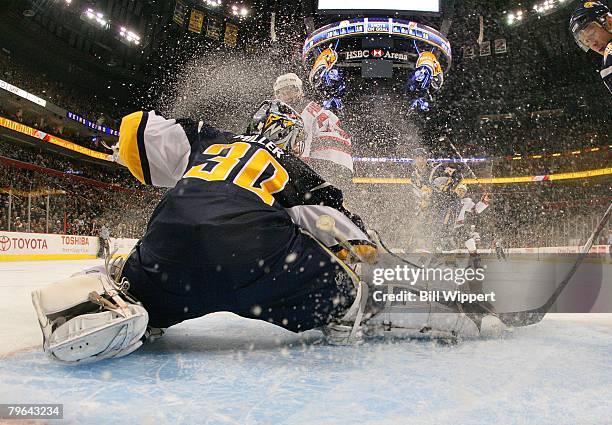 Ryan Miller of the Buffalo Sabres makes a save against the New Jersey Devils on February 6, 2008 at HSBC Arena in Buffalo, New York.