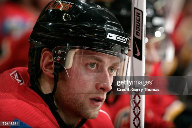 Kristian Huselius of the Calgary Flames watches the game from the bench in between shifts against the Phoenix Coyotes on February 5, 2008 at...