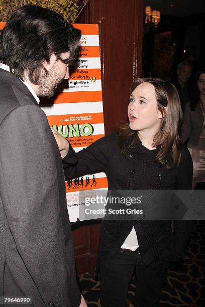 Actress Ellen Page and director Jason Reitman talk during a luncheon to celebrate "Juno" at the 21 Club on February 8, 2008 in New York City.