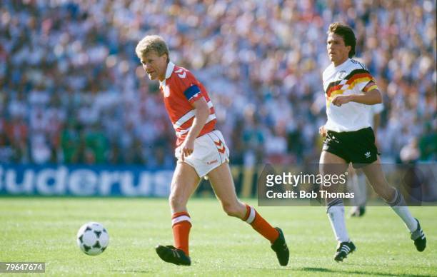 14th June 1988, European Championship Finals, Gelsenkirchen, West Germany 2 v Denmark 0, Denmark's Morten Olsen plays the ball as West Germany's...