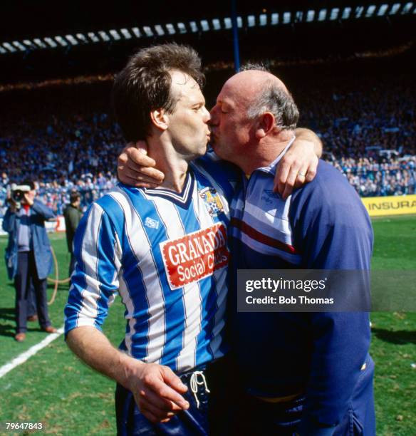 12th April 1987, FA, Cup Semi-Final at Hillsborough, Coventry City 3 v Leeds United 2 a,e,t, Coventry City defender Trevor Peake echanges playful...