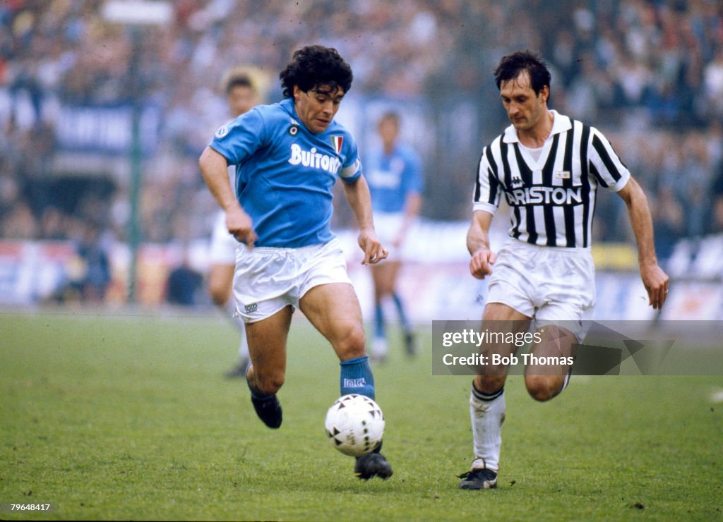 BT Italian League Serie A, pic: 17th April 1988, Juventus 3 v Naples 1, Napoli's Diego Maradona in a race for the ball with Luigi De Agostini of Juventus,Diego Maradona won 91 Argentina caps between 1977-1994