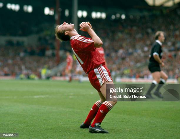 28th April 1990, Division 1, Liverpool 2 v Queens Park Rangers 1, Liverpool's Steve McMahon appears to be praying, Steve McMahon, Liverpool, played...